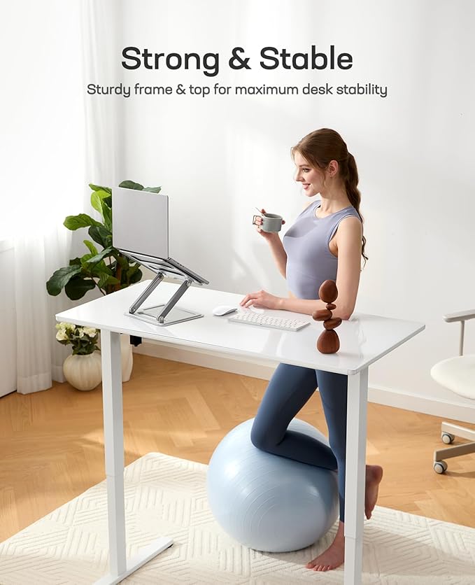 Marsail Glass Standing Desk with Drawer, 55 x 28 Inches Adjustable Desk, Home Office Desks with One-Piece Tempered Glass Top, Ergonomic Home Office Sit Stand Desk with 4 Preset Heights, White